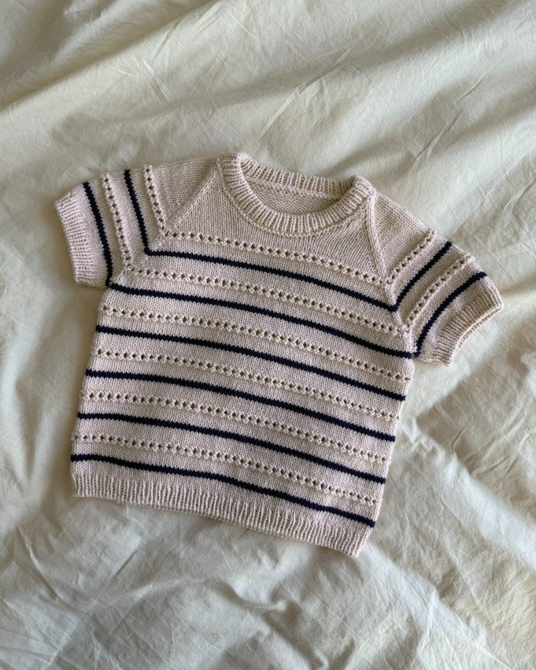 Detaljebillede af lyserød og blå Ida Tee Junior