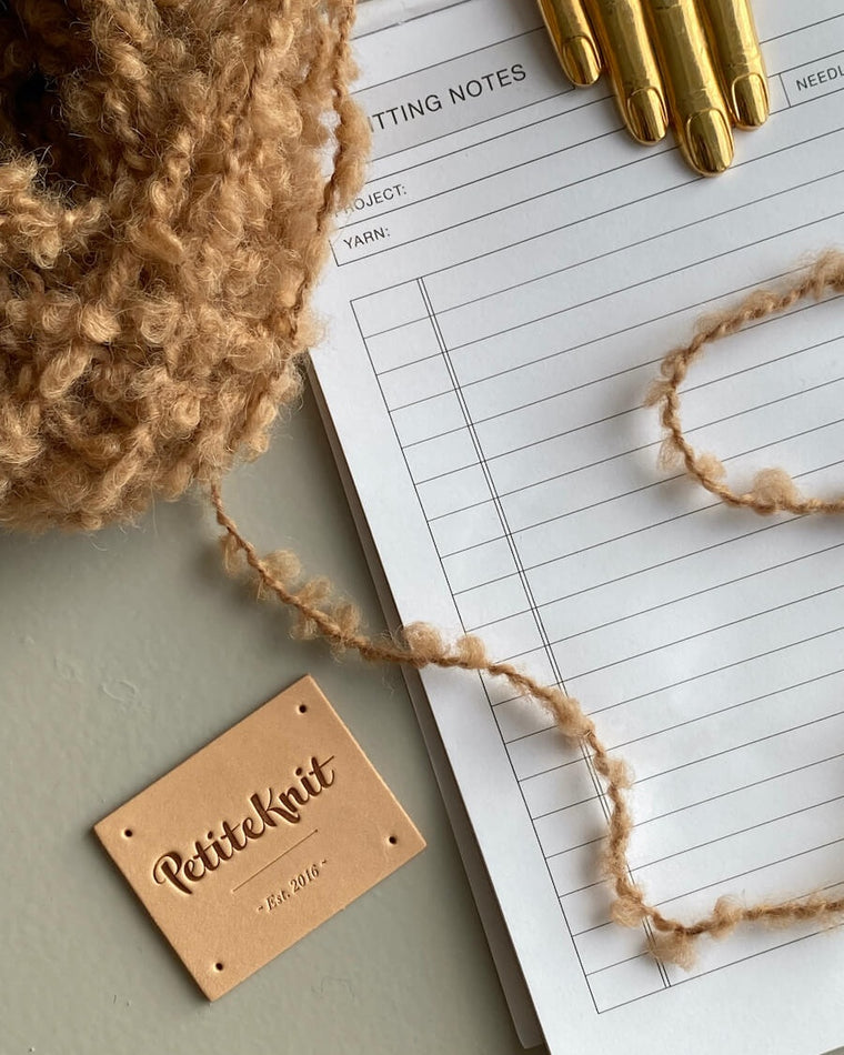 Bunke af "Petiteknit" læderlabel 