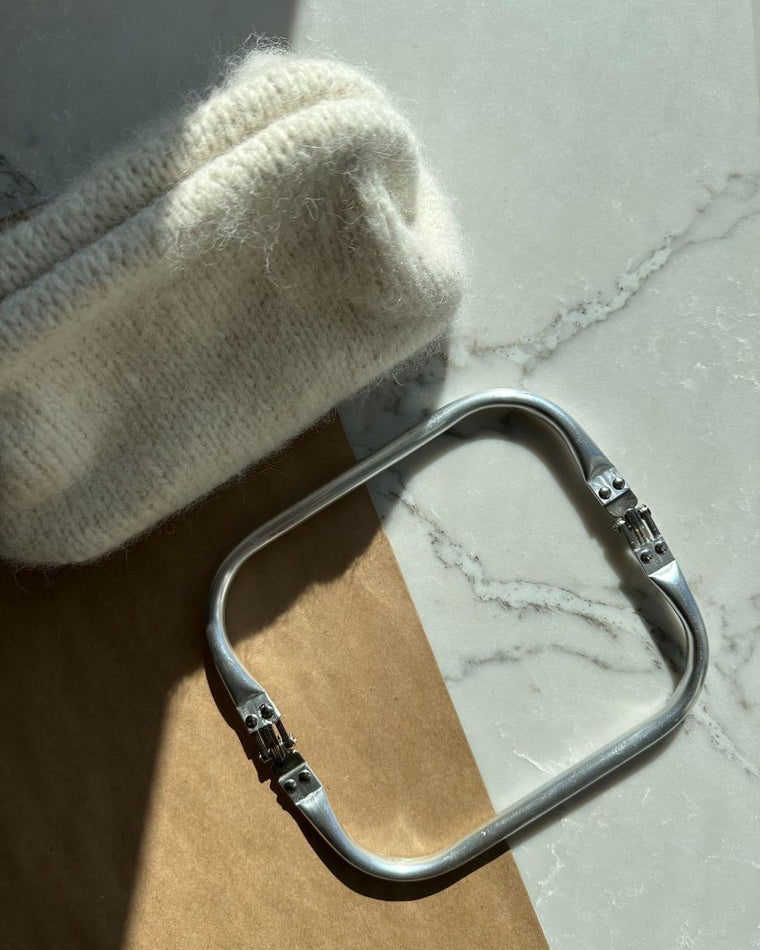 Frame for small clutch