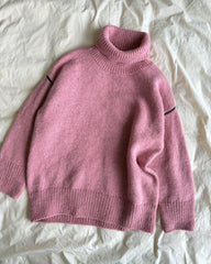 Lyserød Linea Sweater liggende