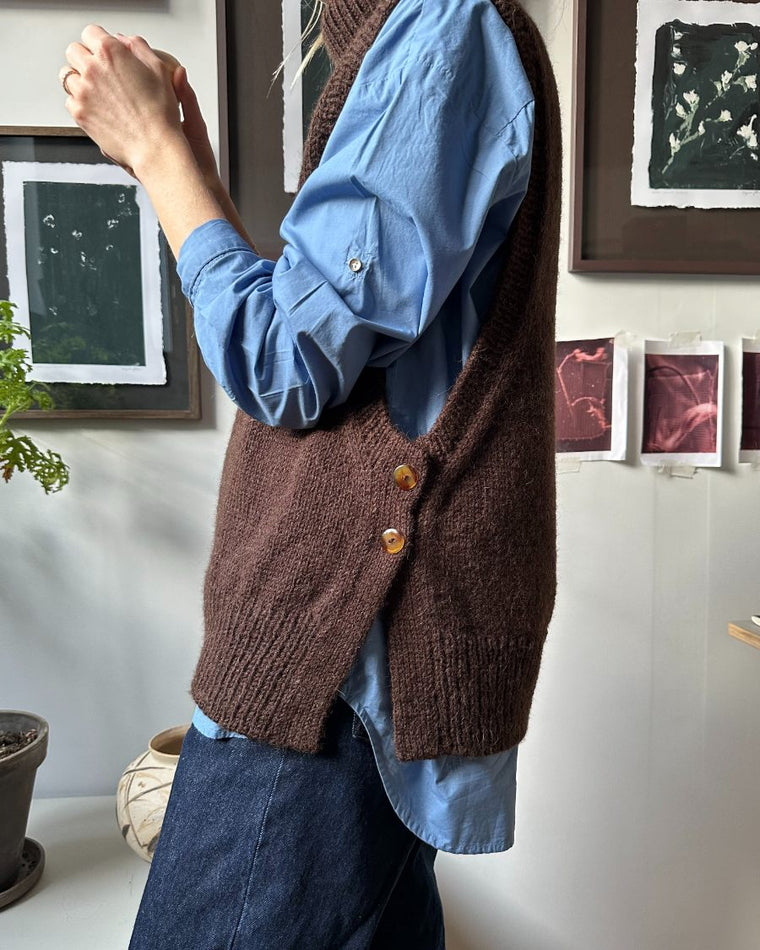 Enkelt galalit knap med 2 huller Ø 20 mm.