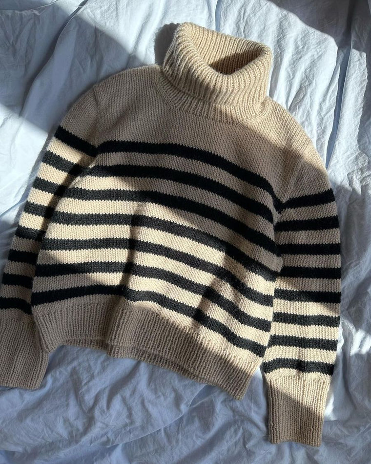 Detaljebillede af hvid og sort Lyon Sweater - Chunky Edition