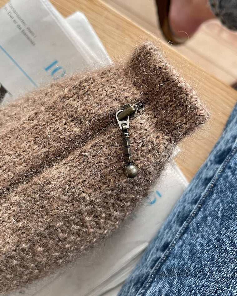 Råhvid, lysegrå og lysebrun honey clutch set oppefra