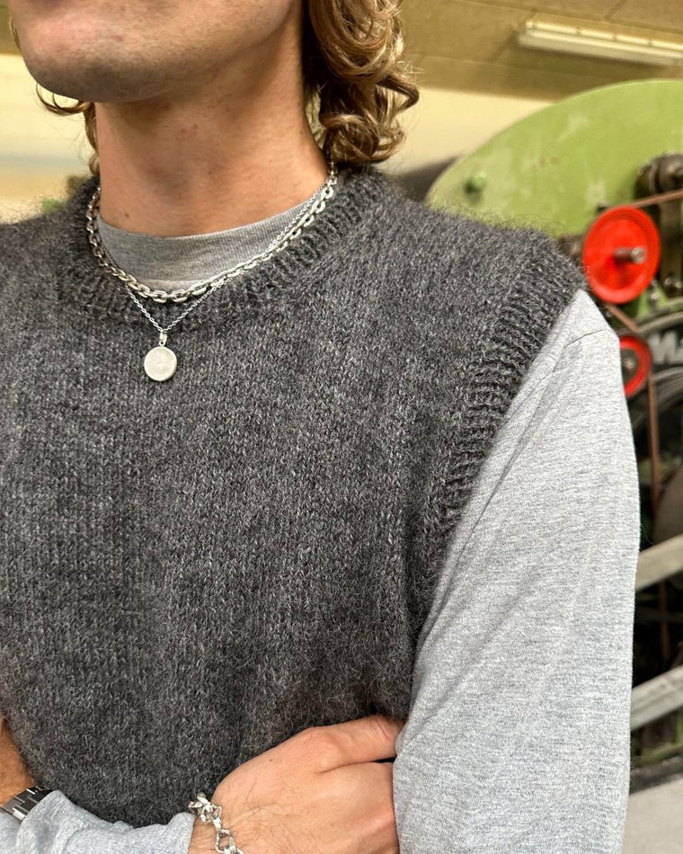 Liggebillede af blå Novice Slipover Man