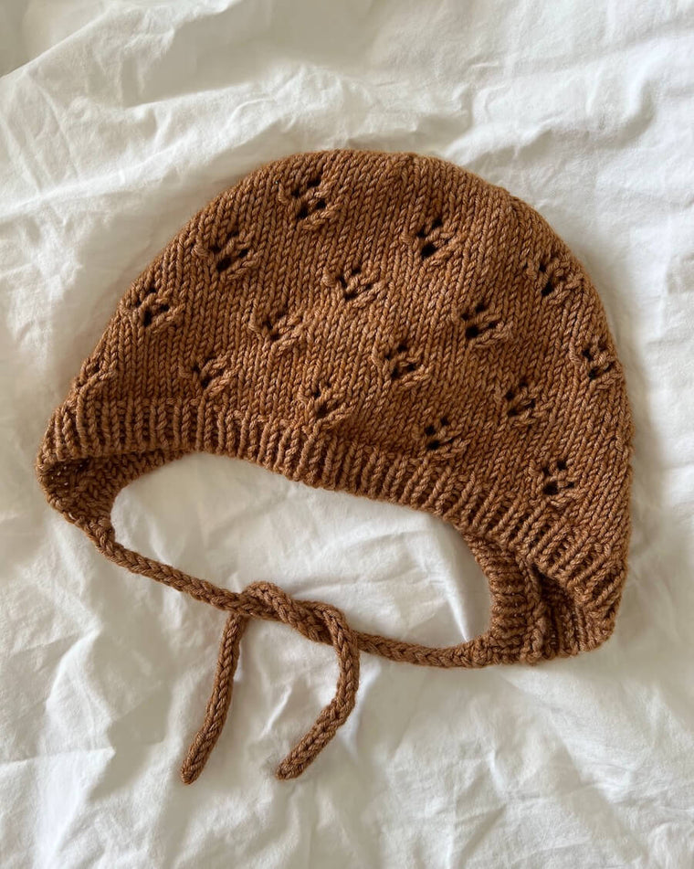 Liggebillede af brun Rigmors Kyse