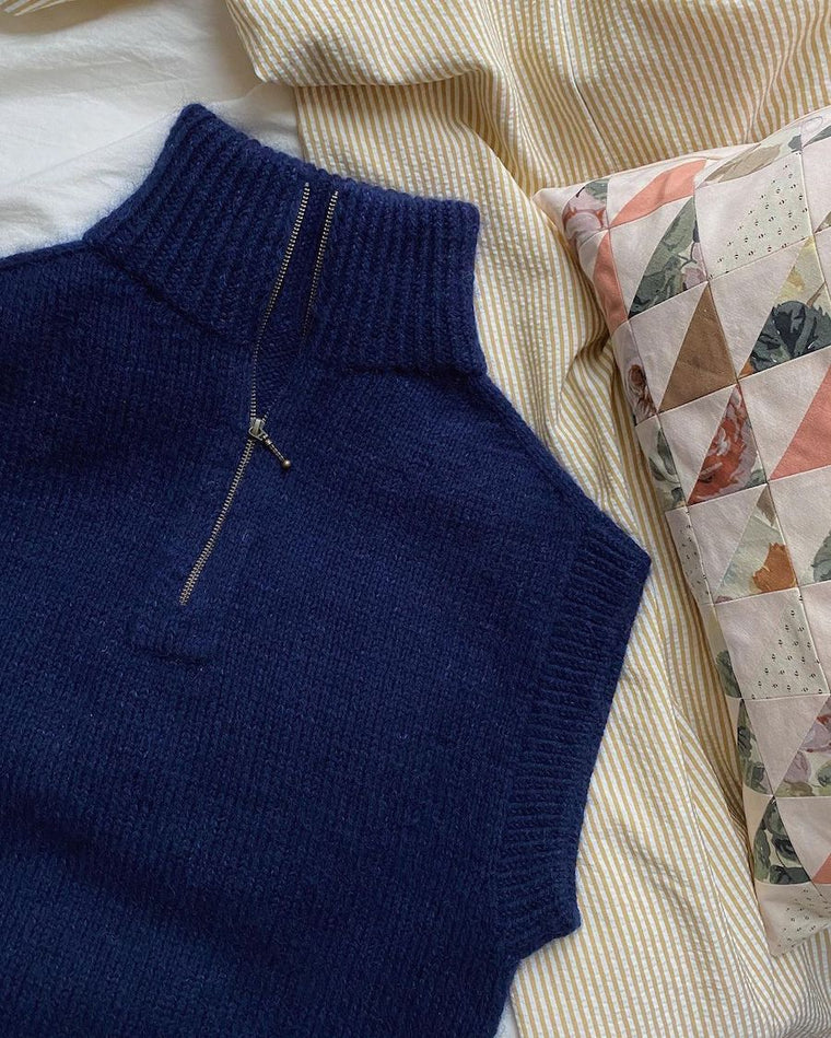 Kvinde iført blå Zipper Slipover